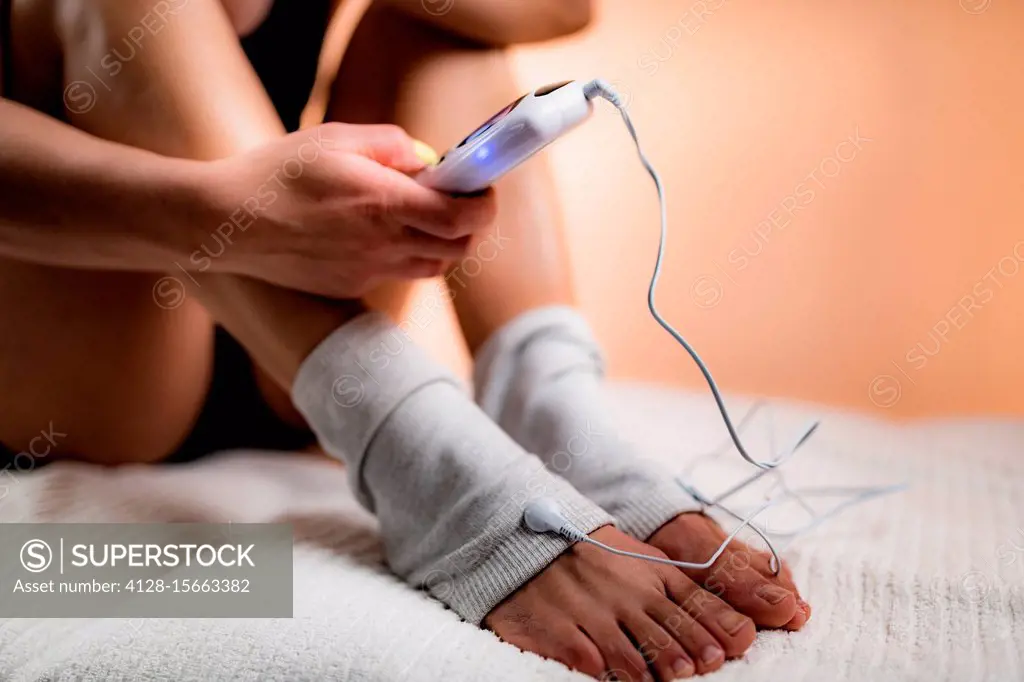 Physical therapy with TENS machine