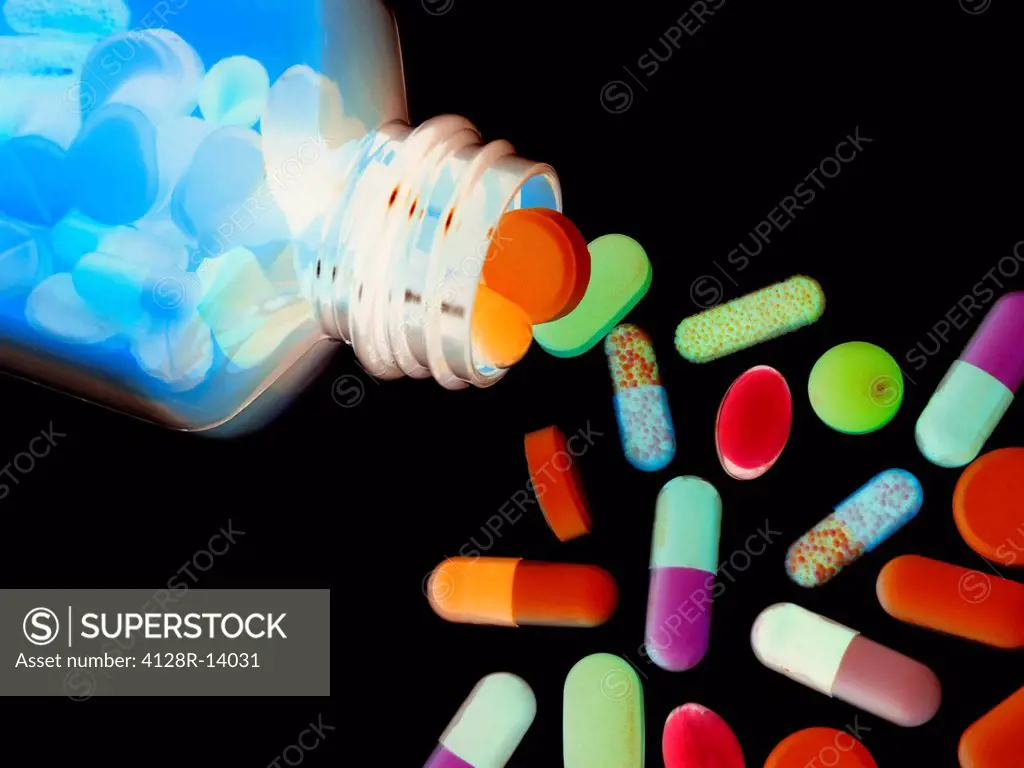 Drugs pouring from a bottle.