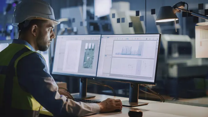 Industrial engineer working on computer