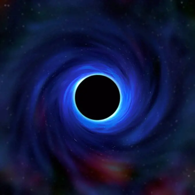 An image showing how a black hole warps space-time in its vicinity.