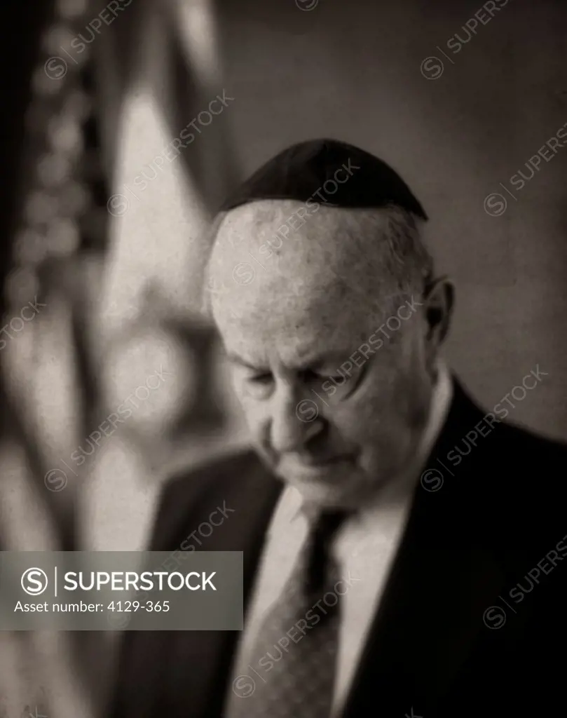 pensive jewish man with yarmulke