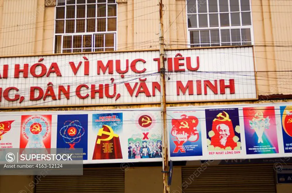 NORTH VIETNAM, HANOI, OLD FRENCH QUARTER, STREET SCENE, COMMUNIST POSTERS AND SLOGANS