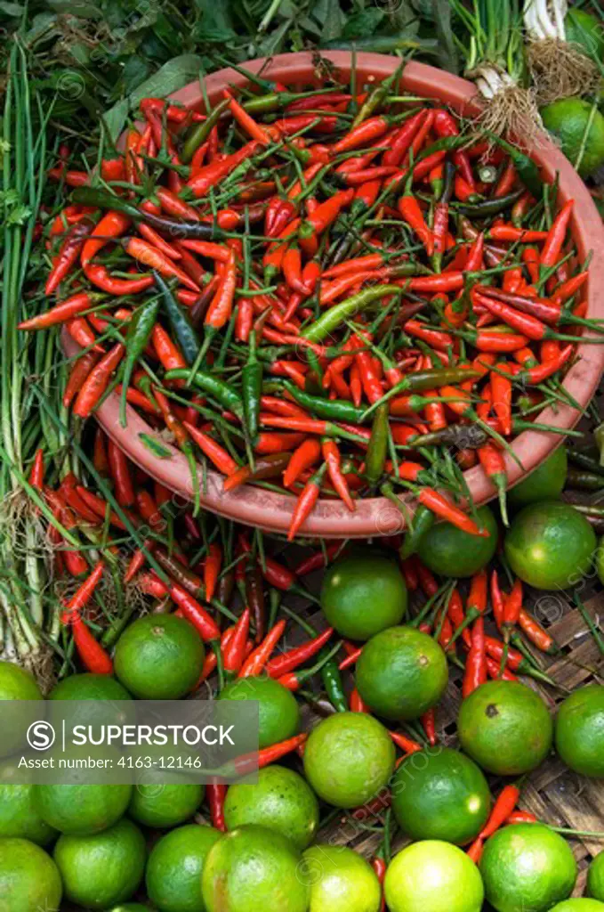 VIETNAM, HUE, MARKET, CHILI PEPPERS AND LIME