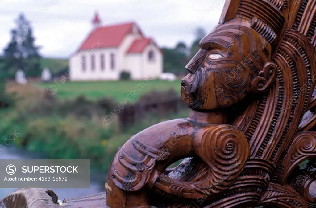 NEW ZEALAND, NEAR ROTORUA, DETAIL OF CARVED CANOE