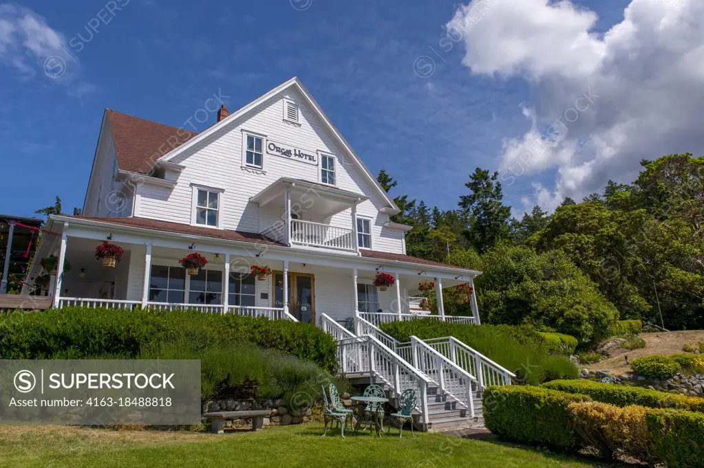 The Orcas Hotel, a historic inn and cafe built 1904, in Orcas Village on Orcas Island in the San Juan Islands in Washington State, United States.