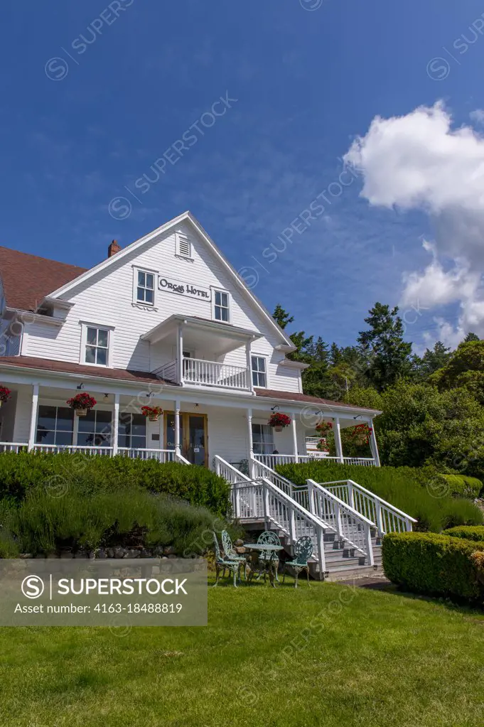 The Orcas Hotel, a historic inn and cafe built 1904, in Orcas Village on Orcas Island in the San Juan Islands in Washington State, United States.