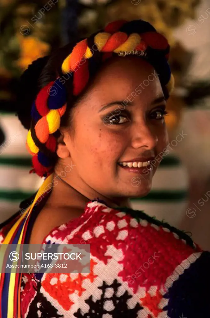 MEXICO, BAJA CALIFORNIA, LA PAZ, FIESTA, YOUNG WOMAN IN TRADITIONAL DRESS, PORTRAIT