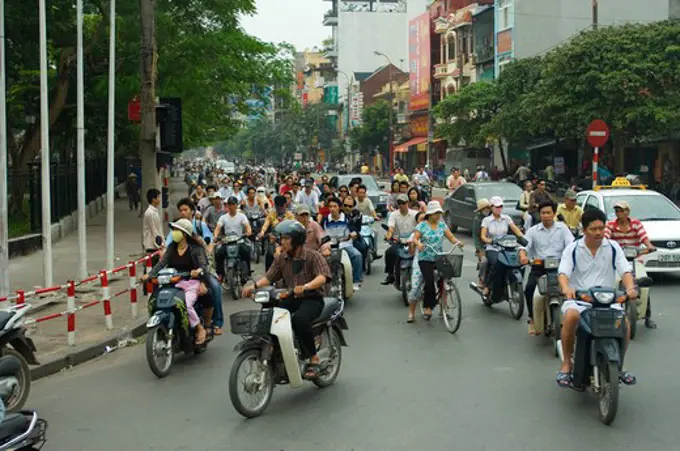 NORTH VIETNAM, HANOI, STREET SCENE, MOPEDS