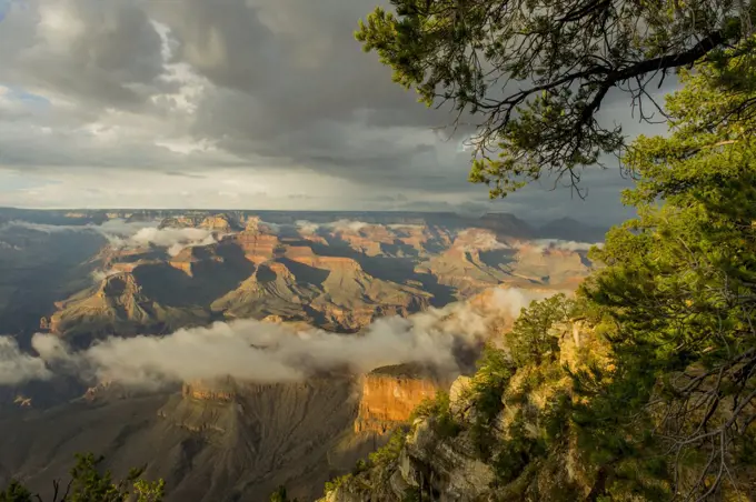 View of the Grand Canyon from the Yavapai Point area on the South Rim with clearing clouds after a thunderstorm in the Grand Canyon National Park in northern Arizona, USA.