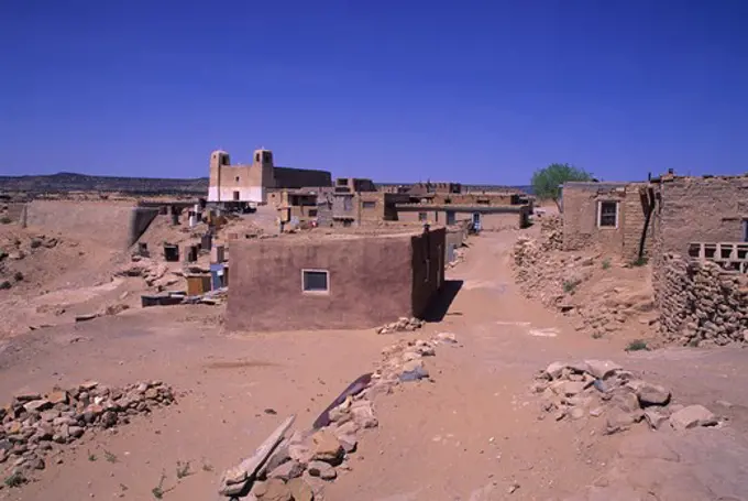 USA, NEW MEXICO, PUEBLO OF ACOMA, ""SKY CITY,"" VIEW OF HOUSES AND MISSION