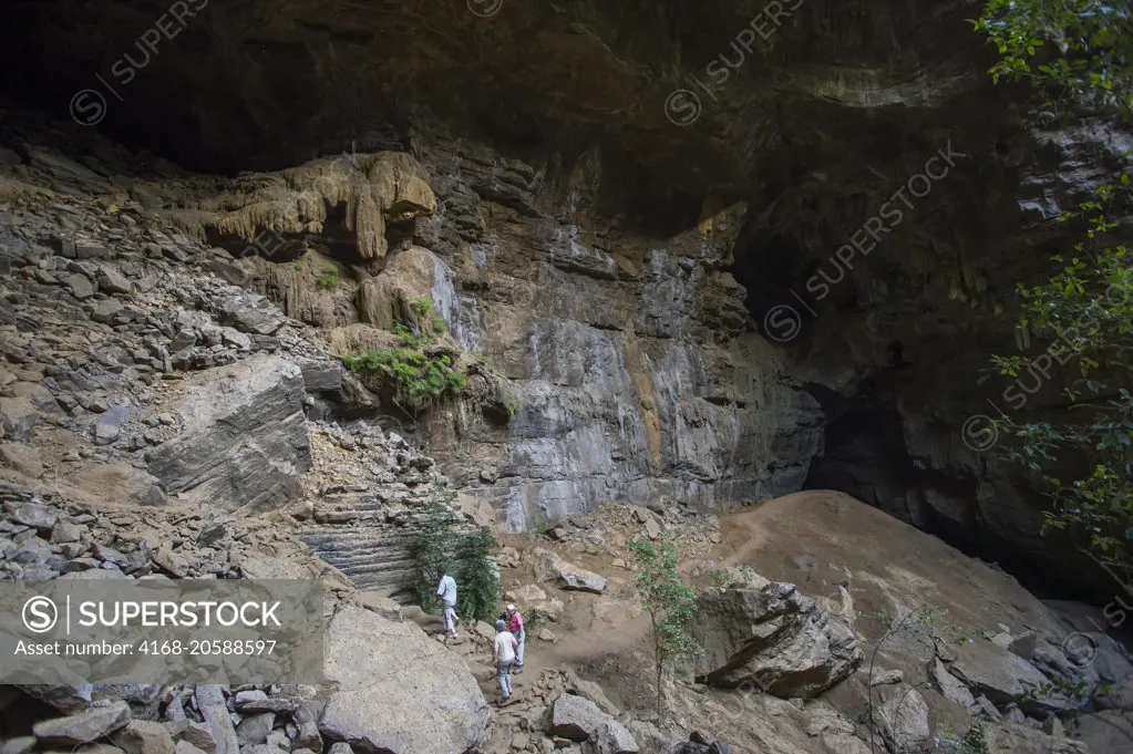 Tourists at limestone cave in Ankarana Reserve in Northern Madagascar.