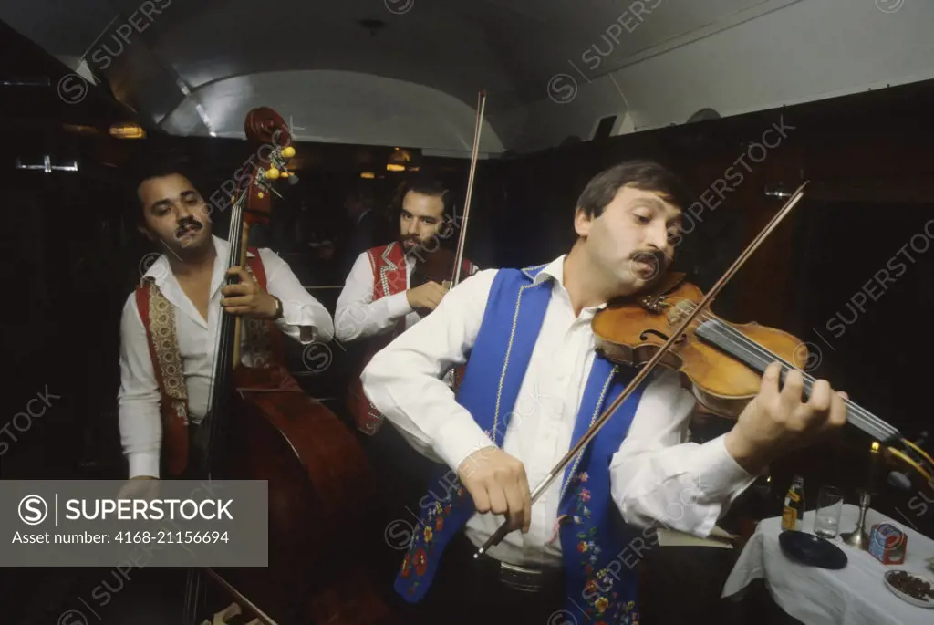 Hungarian gypsy musician performing traditional gypsy music on the Orient Express Train near Budapest, Hungary.