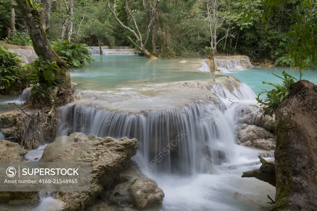 The cascades and turquoise blue pools of the Kuang Si Falls near Luang ...