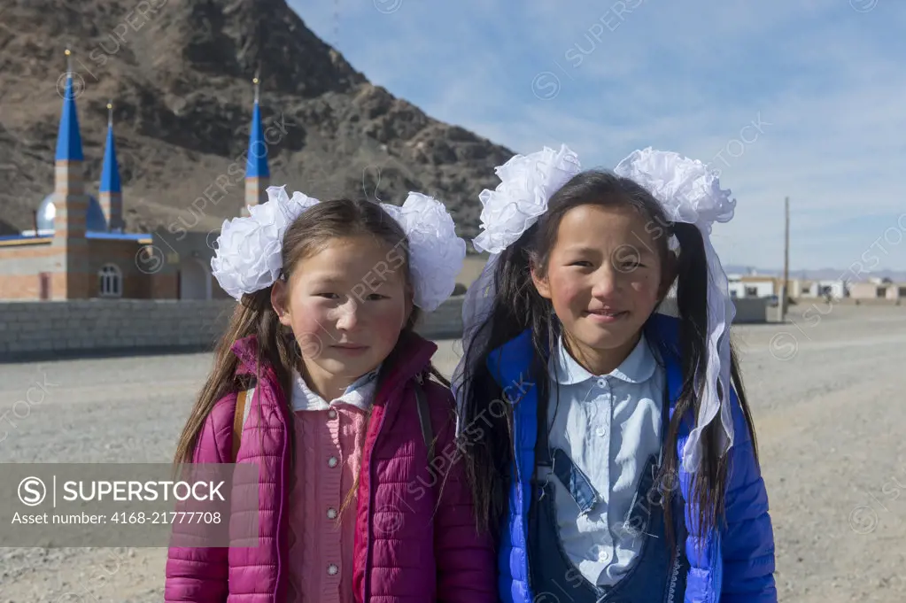 Close-up of two Kazakh girls in the city of Ulgii (Ölgii) in the Bayan-Ulgii Province in western Mongolia.