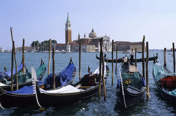 Italy, Venice, Giudecca Canal, Gondolas with San Giorgio Maggiore in background