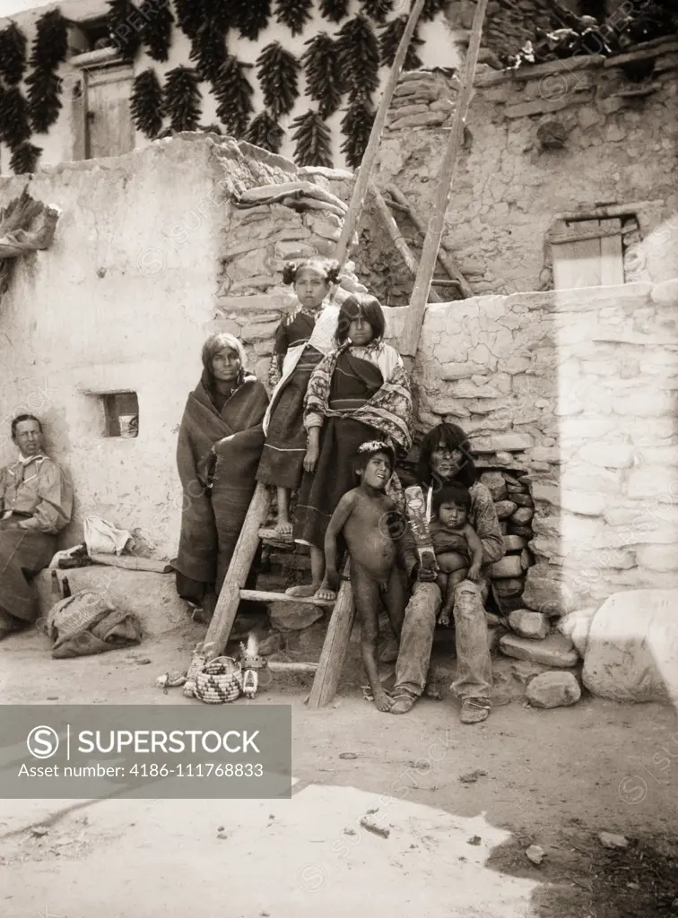 1890 1890s NATIVE AMERICAN HOPI INDIAN FAMILY ADULTS AND CHILDREN POSED LOOKING AT CAMERA ...