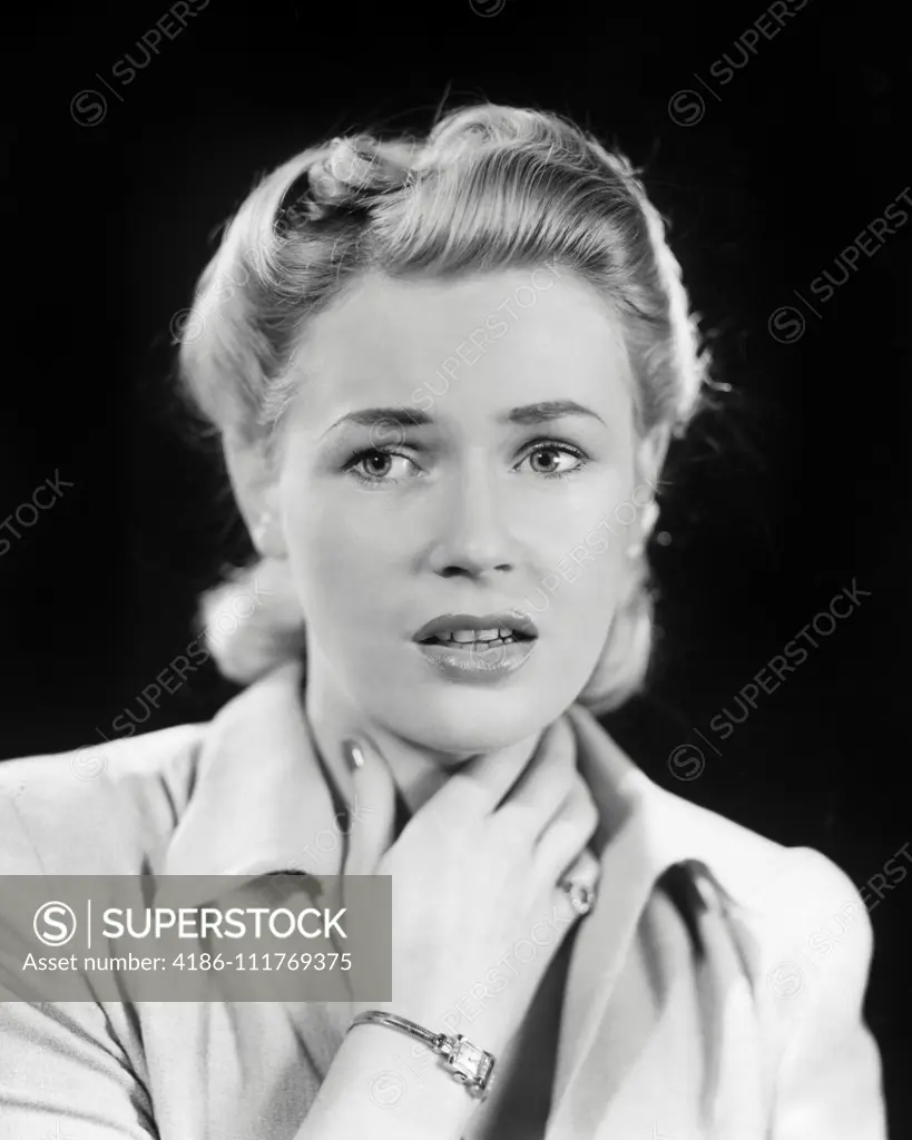 1940s BLONDE WOMAN HAND TO THROAT NECK LOOKING SICK OR PERHAPS SHOCKED