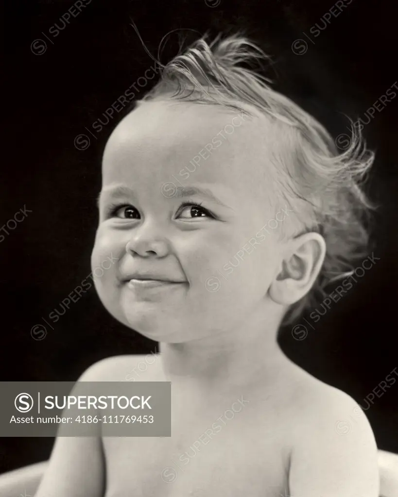 1940s  PORTRAIT SMILING BABY BOY LOOKING AT CAMERA