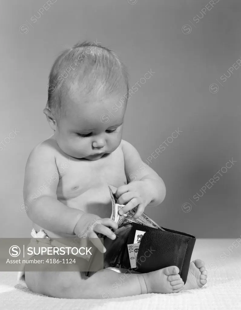 1960S Baby Sitting Wearing Diaper Taking Paper Money Out Of A Wallet