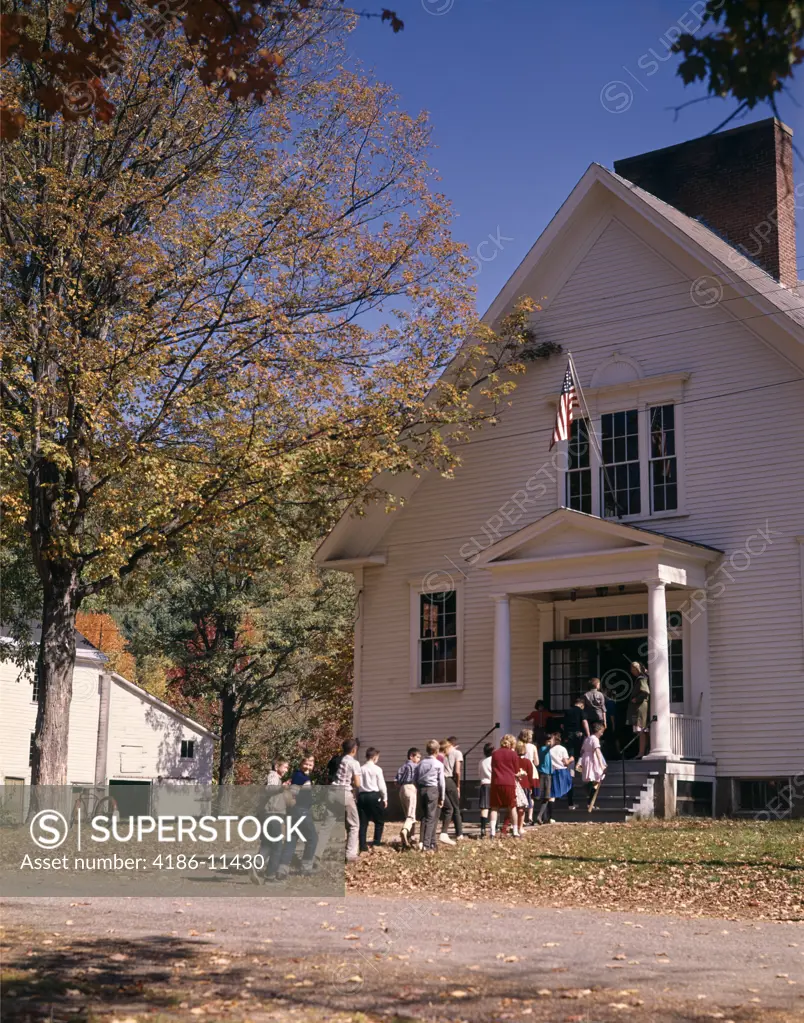 School Children Walking Into Schoolhouse 1970S