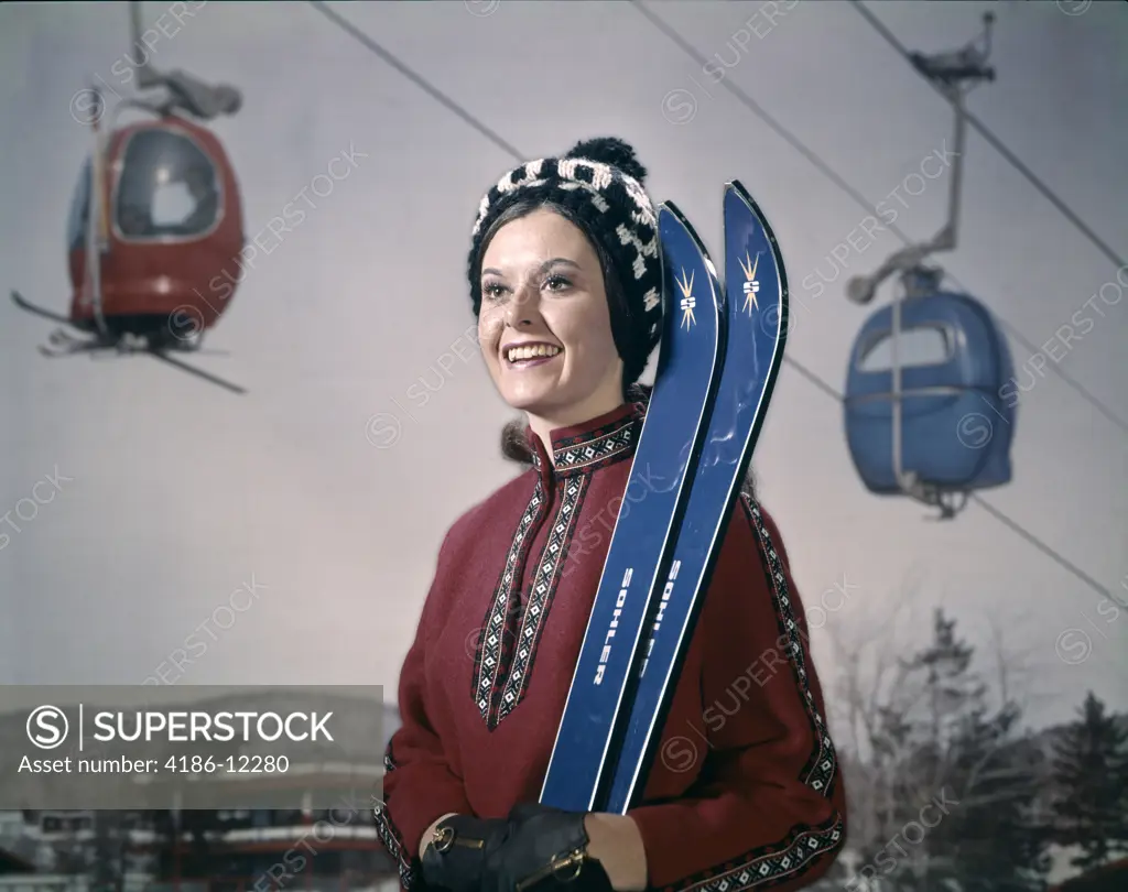 1950S Woman In Winter Gear Hat Holding Skis Ski Lift In Background