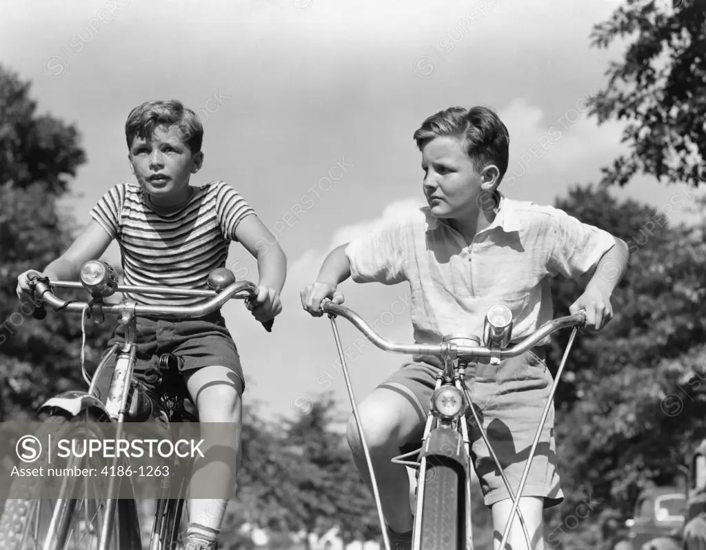 1940S Two Boys Riding Bikes