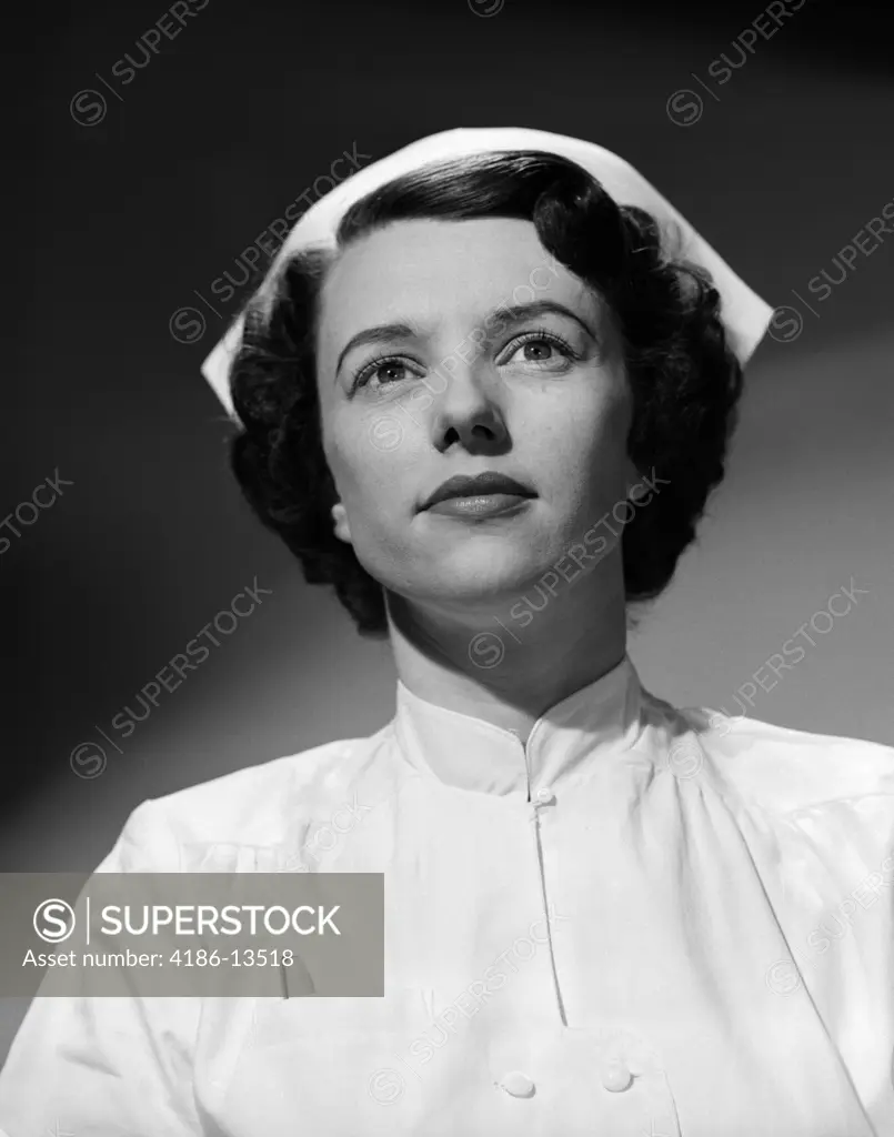 1950S Head Shoulders Portrait Nurse With Serious Express Straight On