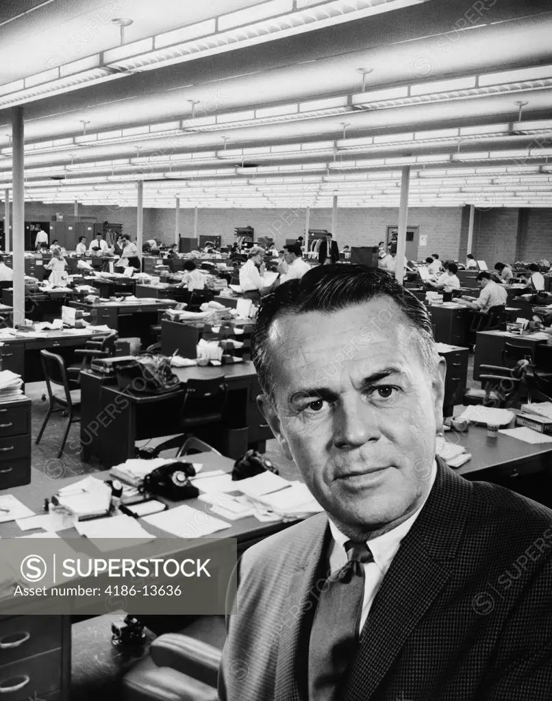 1960S Portrait Of Executive Superimposed Over Busy Office Background