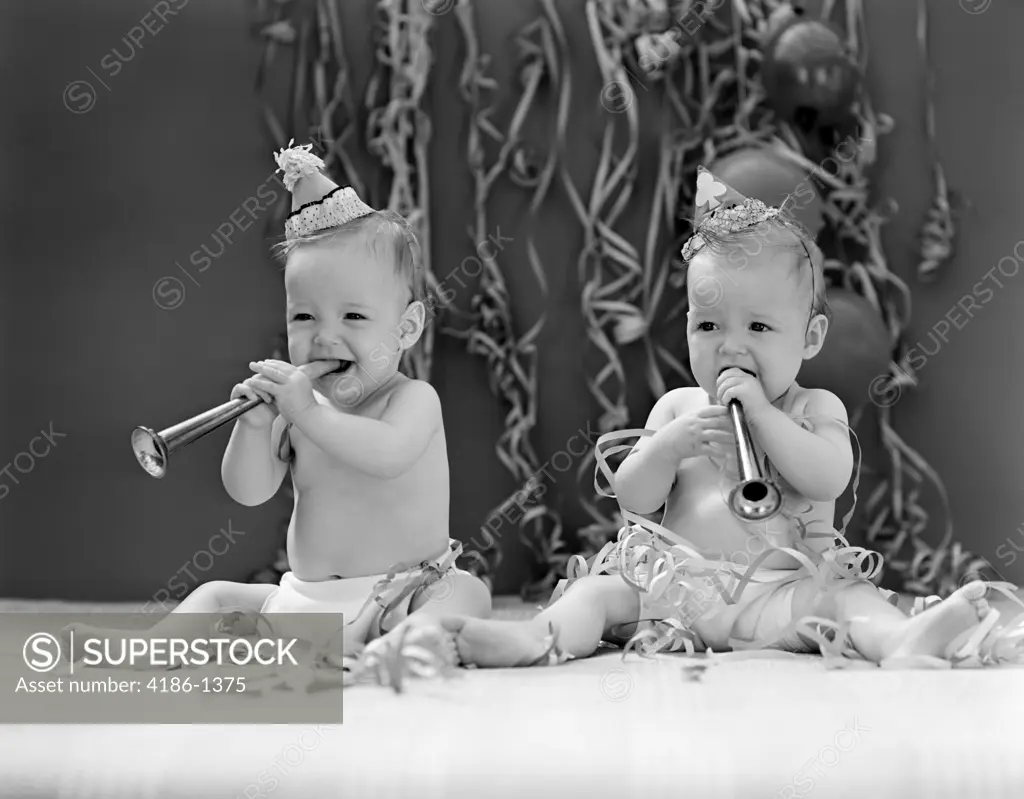 1940S Twin Babies With Party Hats Horns And Paper Streamers New Year Celebration Studio