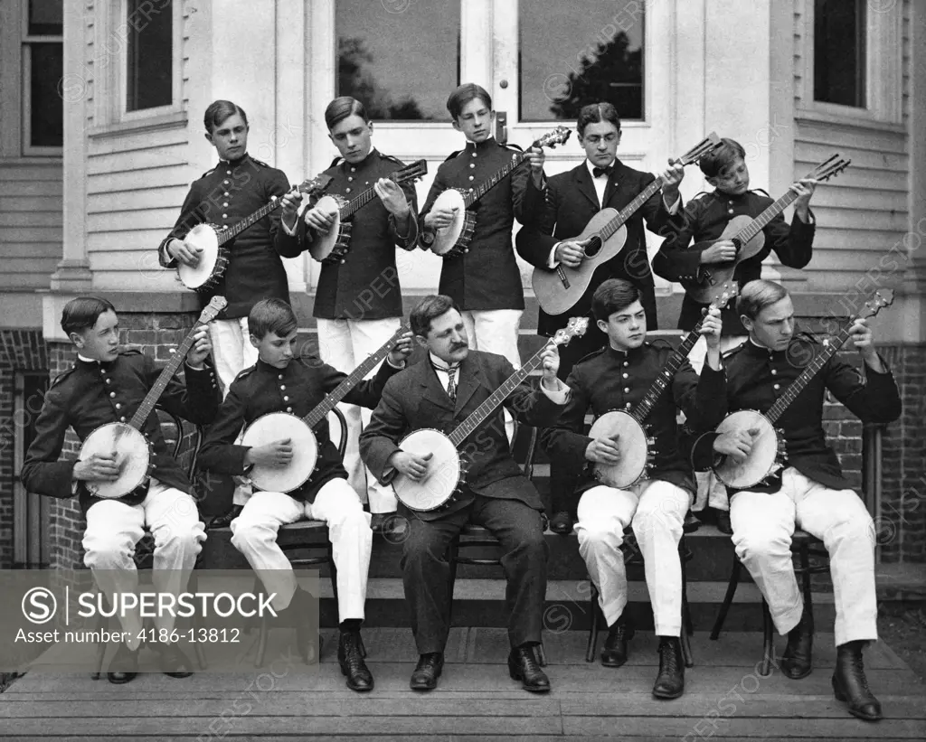 1890S 1900S Group Young Men Playing Banjos And Guitars In String Orchestra