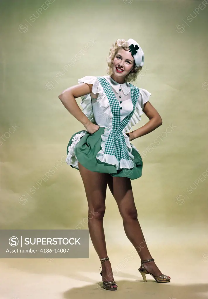 1940S 1950S Portrait Smiling Blond Woman Pinup Wearing Green Checked Waitress Uniform And Hat With Shamrock Looking At Camera