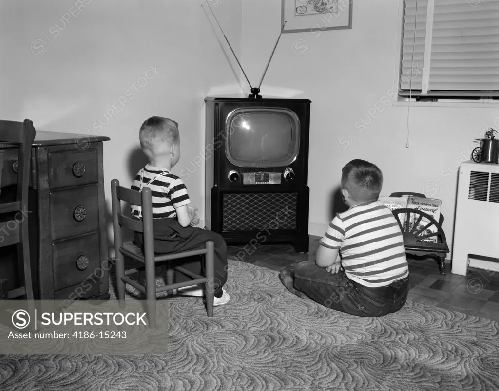 1950S Two Boys Sitting In Living Room Watching Television