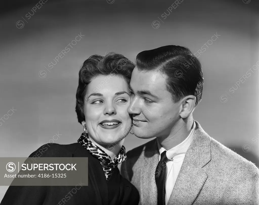 1950S Head To Head Portrait Smiling Couple Flirting Man Woman