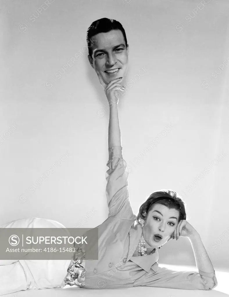 1960S Graphic Effect Woman Holding Up Man'S Head Trophy Triumph Battle Of The Sexes