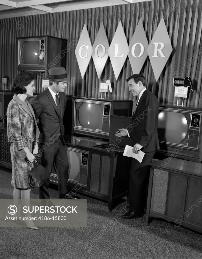 1960S Couple In Department Store With Color Tv Salesman