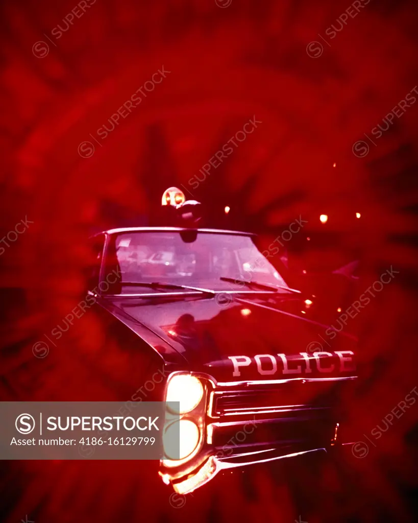 1970s POLICE CAR BRIGHT HEADLIGHTS FLASHING RED COLOR-BURST SYMBOLIC GRAPHIC EFFECT