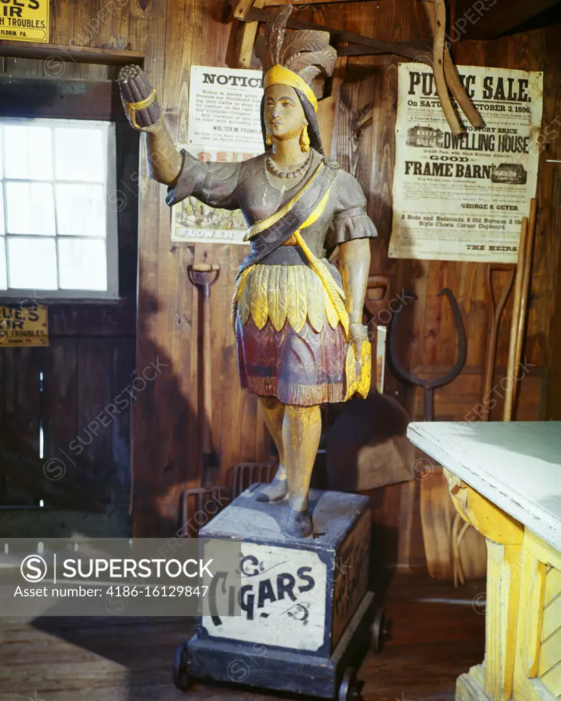 1960s ANTIQUE PAINTED CARVED WOODEN CIGAR STORE NATIVE AMERICAN INDIAN MAIDEN OFFERING A BUNDLE OF CIGARS ADVERTISING SCULPTURE 