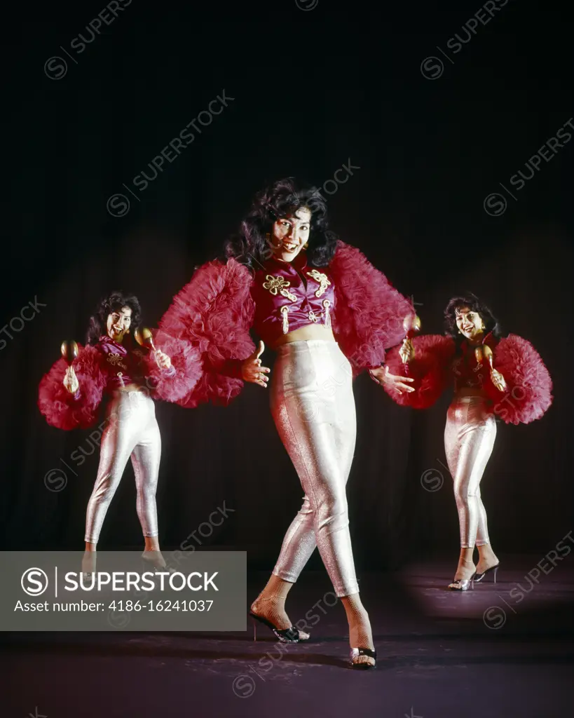 1970s LATIN MUSIC TRIPTYCH SMILING WOMAN DANCER PLAYING MARACAS LOOKING AT CAMERA WEARING SILVER LAME TIGHTS RED RUFFLED SLEEVES