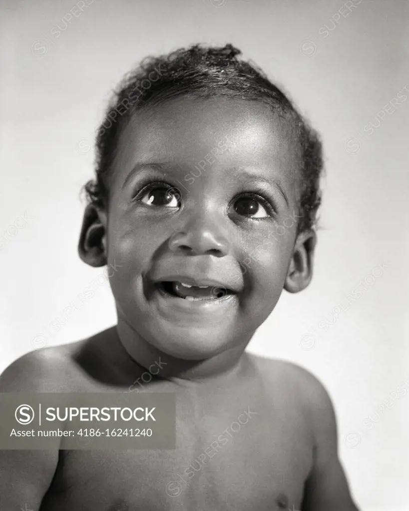 1960s PORTRAIT SMILING AFRICAN-AMERICAN BABY BOY 