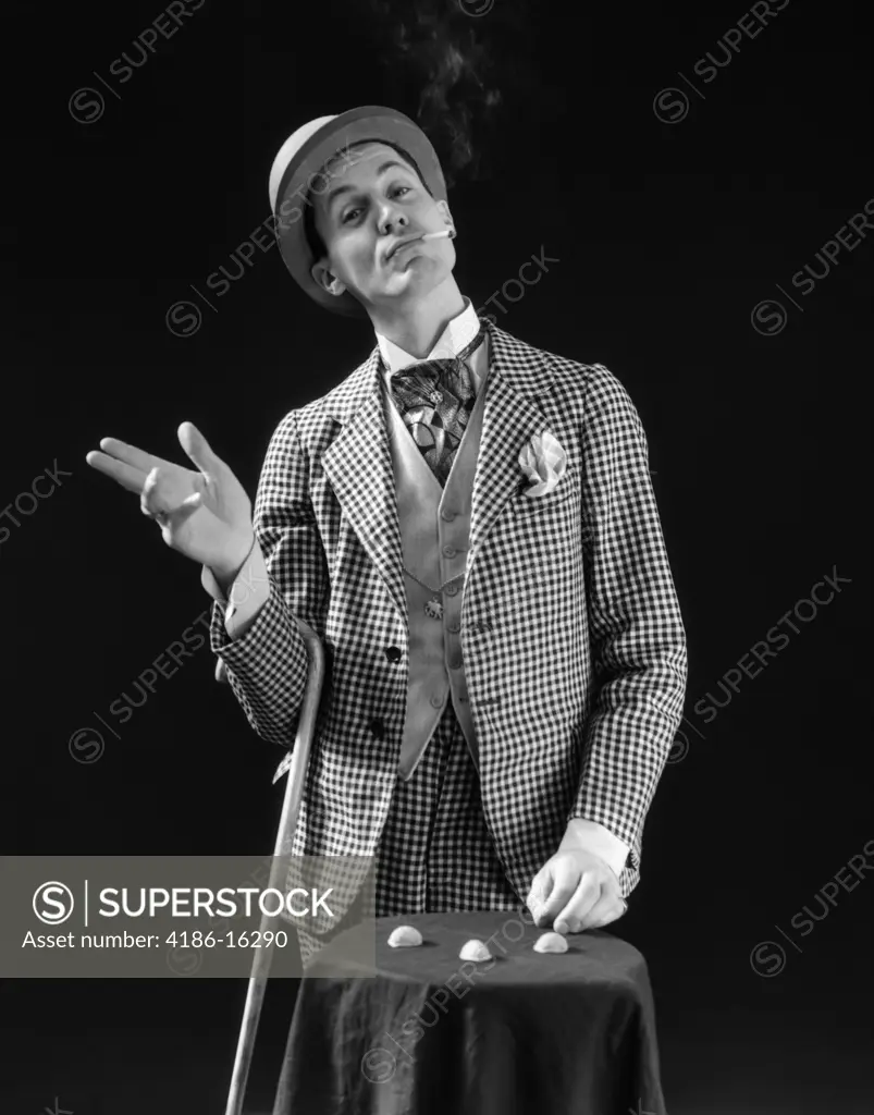 1930S Barker In Checkered Suit & Cigarette In Mouth Playing Shell Game