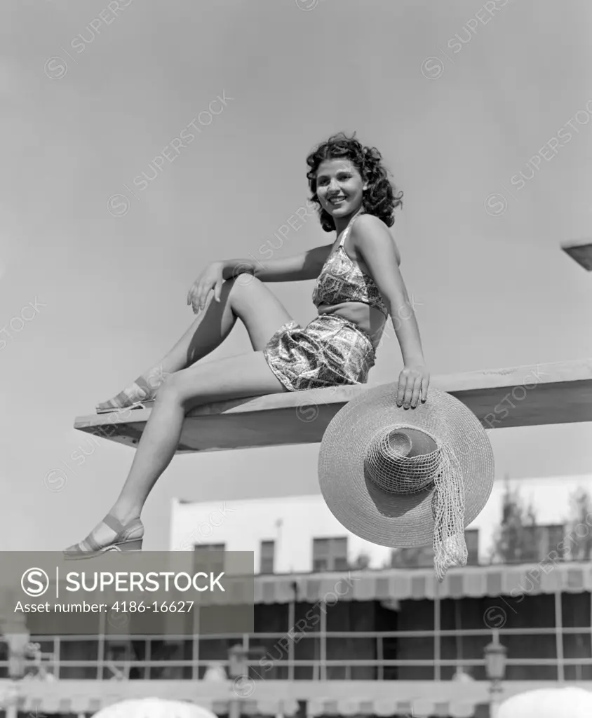 1930S 1940S Woman Holding Hat Posing Diving Board Swim Suit Pool Travel Vacation Swimming Hotel Miami Florida