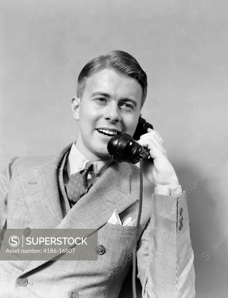 1930S Businessman In Plaid Suit And Vest Talking On Telephone Smiling Double Breasted 