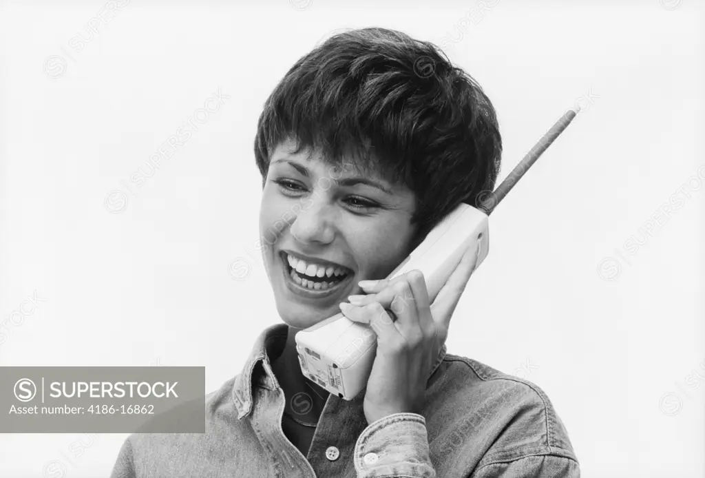 1990S Smiling Woman Talking On Cordless Telephone