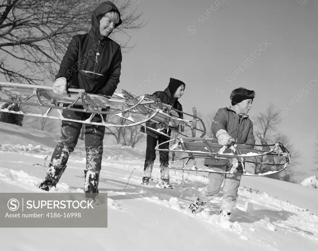 1960S Three Boys Holding Sleds