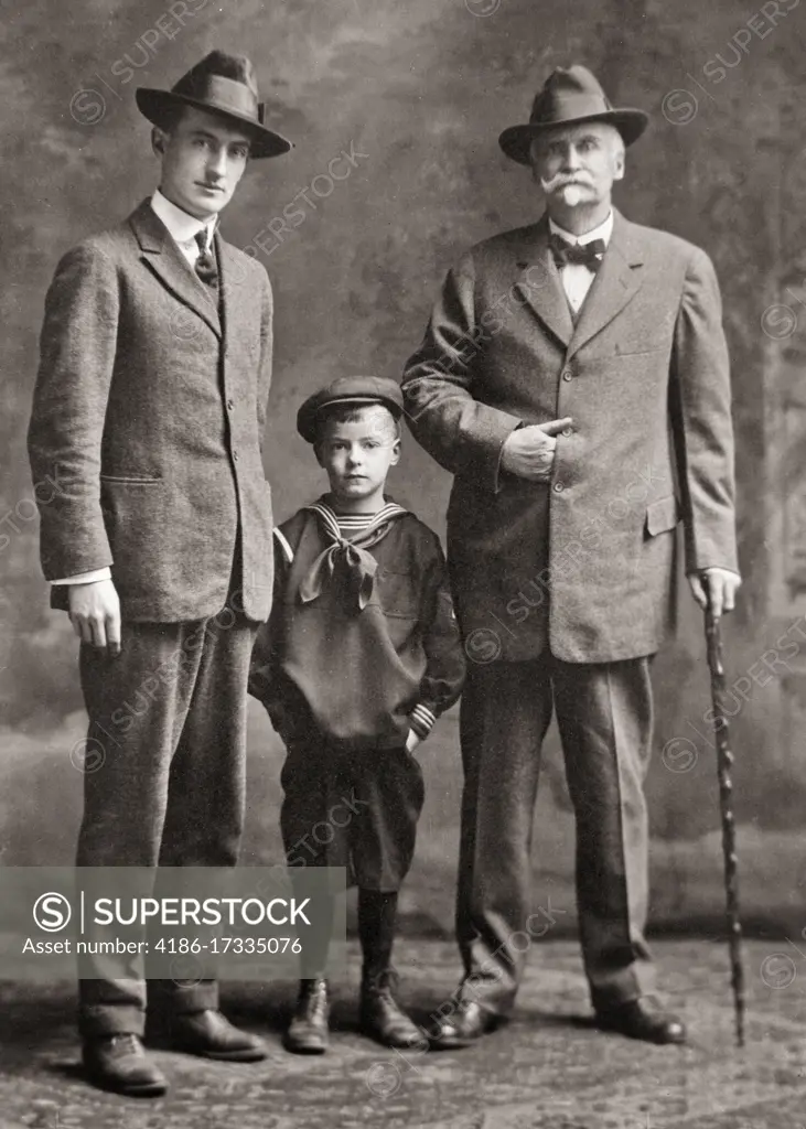 1900s 1890s TURN OF THE CENTURY THREE GENERATION MEN FAMILY FATHER SON AND GRANDFATHER PORTRAIT SUITS AND TIES LOOKING AT CAMERA