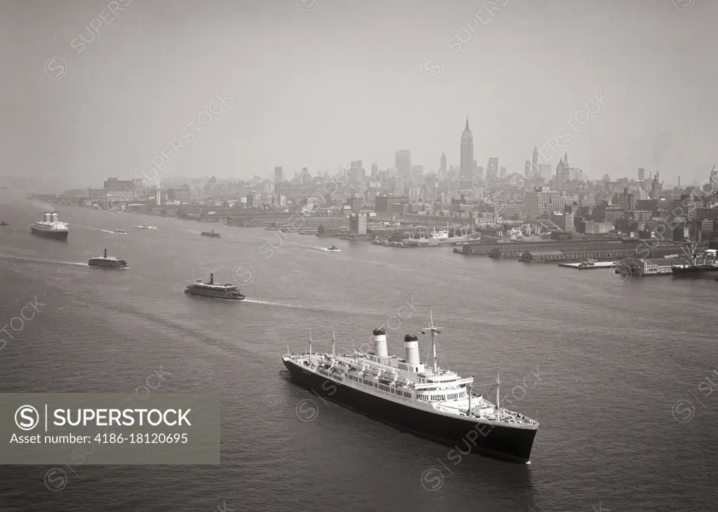 1950s OCEAN LINER SS CONSTITUTION FOLLOWED BY SS UNITED STATES LEAVING MANHATTAN VIA HUDSON RIVER PAST SKYLINE OF NYC USA 