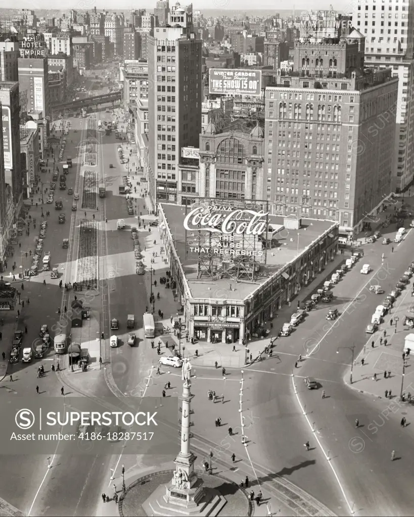 1930s COLUMBUS CIRCLE WITH INTERSECTION OF BROADWAY ON LEFT WITH TROLLEY CARS AND CENTRAL PARK WEST AND 59TH STREETS NYC USA