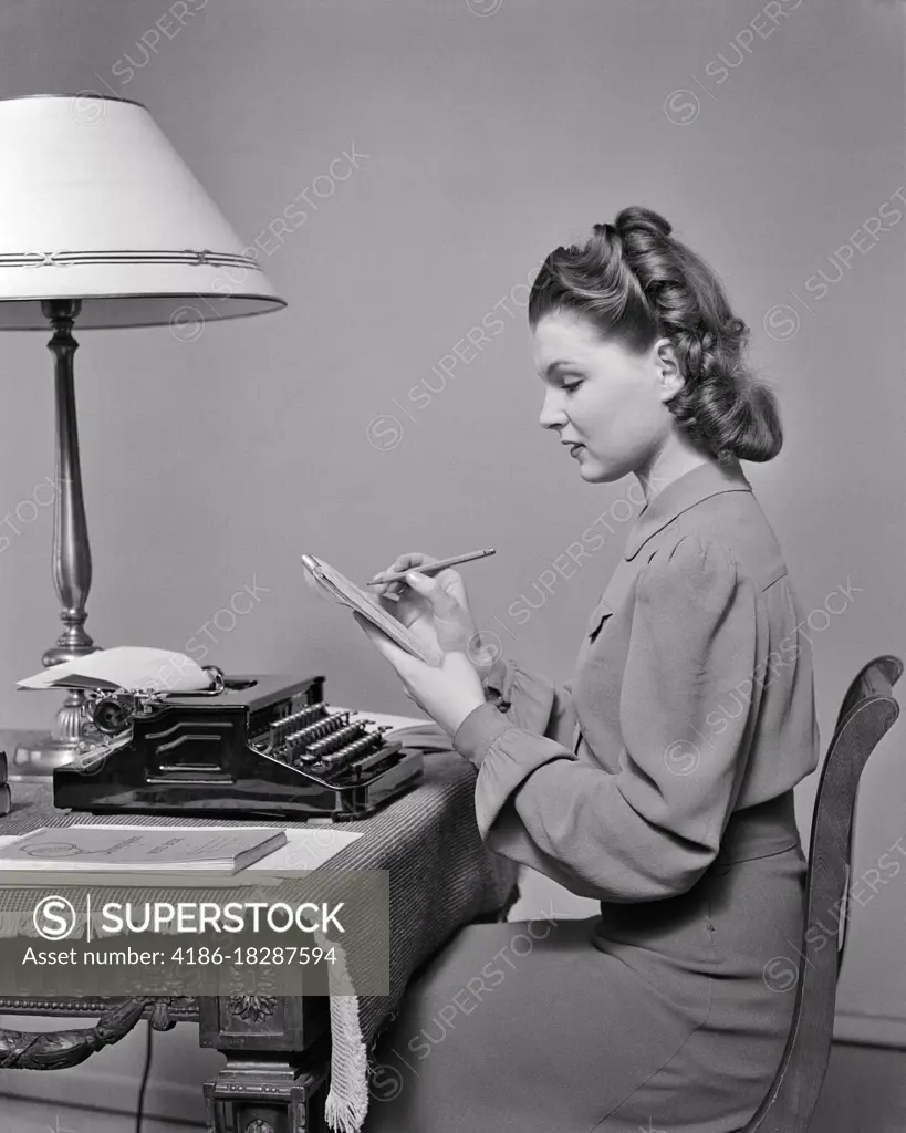 1940s PRIM AND PROPER YOUNG WOMAN AT HOME STUDYING PRACTICING WRITING EDITING TYPING AND STENOGRAPHY SELF MOTIVATED