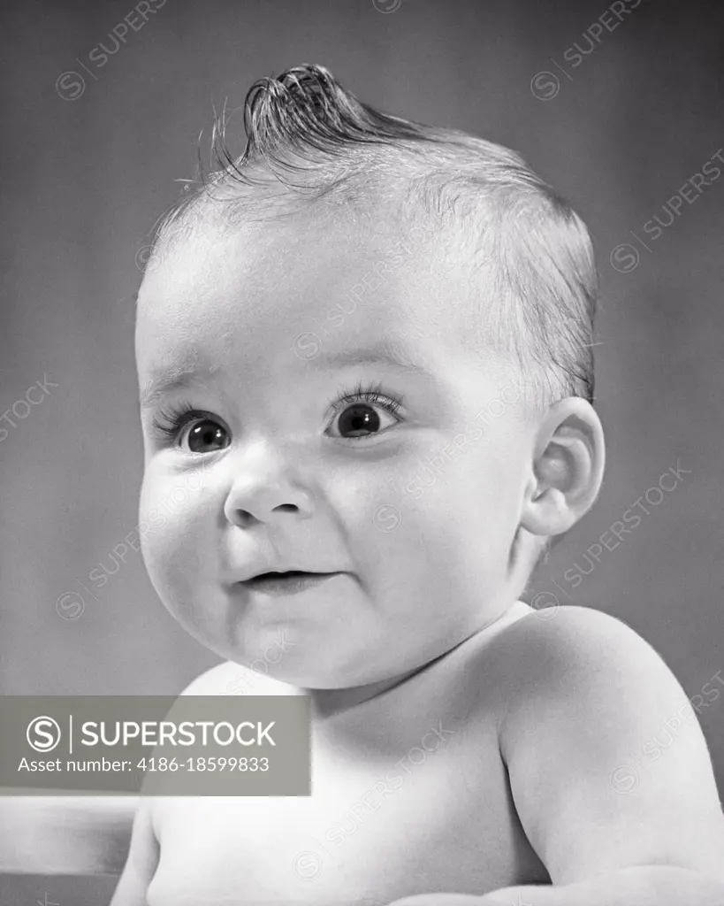 1950s WIDE-EYED BABY GIRL WITH EXCITED INTERESTED CURIOUS FACIAL ...