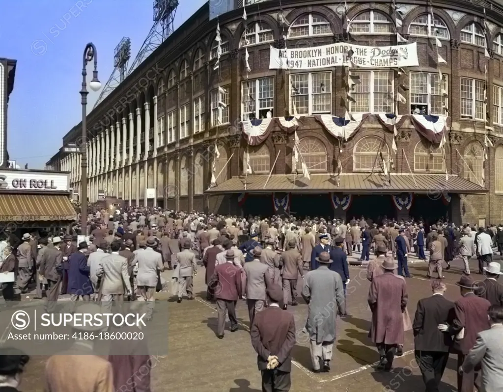 1940s OCTOBER 1947 DODGER BASEBALL FANS POUR INTO MAIN ENTRANCE EBBETS FIELD BROOKLYN BOROUGH NEW YORK CITY USA